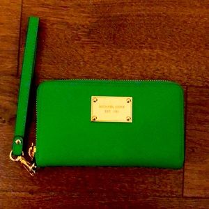 Michael Kors wristlet with gold detail